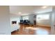 Bedroom with hardwood floors, neutral walls, built in shelves, and bright natural light at 4216 W Solano Dr, Phoenix, AZ 85019