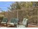 Backyard patio featuring three comfortable green lounge chairs on gravel at 4308 E Smokehouse Trl, Cave Creek, AZ 85331