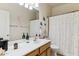 Bright bathroom featuring a vanity, framed mirror and tub and shower combination at 4308 E Smokehouse Trl, Cave Creek, AZ 85331