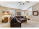 Well-lit living room with modern decor, plush furniture, and bright windows at 4308 E Smokehouse Trl, Cave Creek, AZ 85331