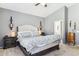 Serene bedroom with a large upholstered headboard and coordinating nightstands at 4308 E Smokehouse Trl, Cave Creek, AZ 85331