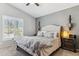 Well-lit main bedroom featuring a vaulted ceiling, plush carpeting and a comfortable king-size bed at 4308 E Smokehouse Trl, Cave Creek, AZ 85331