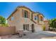 Tan two-story home featuring desert landscaping and a driveway at 4617 S Carmine --, Mesa, AZ 85212