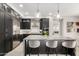 Well-appointed kitchen featuring a stainless steel refrigerator, a large island, and modern pendant lighting at 5250 E Deer Valley Dr # 146, Phoenix, AZ 85054