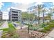 Inviting pool area featuring lounge seating, modern landscaping and a cozy fire pit at 5250 E Deer Valley Dr # 146, Phoenix, AZ 85054