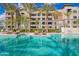 Stunning swimming pool featuring a sun-soaked deck and swaying palm trees at 5250 E Deer Valley Dr # 146, Phoenix, AZ 85054