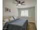 This is a bedroom with a large bed and a ceiling fan at 5618 W Blackhawk Dr, Glendale, AZ 85308