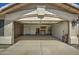 Open garage showcasing storage, workbench area, and ample space for vehicles and projects at 5618 W Blackhawk Dr, Glendale, AZ 85308