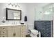 Elegant bathroom features a modern walk-in shower, ornate vanity, and stylish fixtures for a luxurious feel at 624 E Laguna Dr, Tempe, AZ 85282