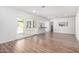 Bright living room featuring hardwood floors and glass doors to the patio at 624 E Laguna Dr, Tempe, AZ 85282