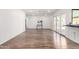 Spacious living room with hardwood floors and sliding glass doors to the patio at 624 E Laguna Dr, Tempe, AZ 85282