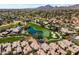 Stunning aerial view of the property, golf course and community with mountain backdrop at 7705 E Doubletree Ranch Rd # 21, Scottsdale, AZ 85258