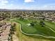 Stunning aerial view of a golf course community with lush green fairways and scenic desert landscapes at 7705 E Doubletree Ranch Rd # 21, Scottsdale, AZ 85258