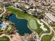 Beautiful aerial shot featuring lush landscaping, a scenic lake and a manicured golf course at 7705 E Doubletree Ranch Rd # 21, Scottsdale, AZ 85258