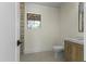 Bathroom featuring a wooden vanity, shower with glass door and a view to the outside at 7705 E Doubletree Ranch Rd # 21, Scottsdale, AZ 85258