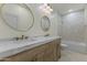 Bathroom featuring double vanity, marble countertop, and modern fixtures at 7705 E Doubletree Ranch Rd # 21, Scottsdale, AZ 85258