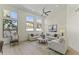 Bright living room featuring high ceilings, modern lighting, and plentiful natural light at 7705 E Doubletree Ranch Rd # 21, Scottsdale, AZ 85258