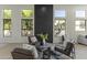 Comfortable living room with contemporary furnishings and a striking dark stone fireplace at 7705 E Doubletree Ranch Rd # 21, Scottsdale, AZ 85258