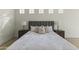 An interior shot of the bed with a gray headboard and matching side tables with lamps at 7705 E Doubletree Ranch Rd # 21, Scottsdale, AZ 85258