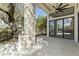 Relaxing outdoor living area with ceiling fan and sliding glass doors to the indoors at 7705 E Doubletree Ranch Rd # 21, Scottsdale, AZ 85258