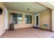 Back patio featuring ceiling fan, a painted floor and a lounge chair at 10414 W Windsor Ave, Avondale, AZ 85392