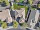 An aerial view captures the house with a private backyard and neighboring houses at 1093 E Doral Ave, Gilbert, AZ 85297