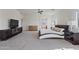Spacious bedroom showcasing carpet, modern furniture, natural light, and ample space at 1093 E Doral Ave, Gilbert, AZ 85297