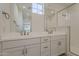 Elegant bathroom with double sink vanity, spacious glass shower, and modern fixtures offers a luxurious, spa-like experience at 11300 N Casa Dega Dr # 1044, Surprise, AZ 85388