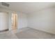 Unfurnished primary bedroom with carpet at 11300 N Casa Dega Dr # 1044, Surprise, AZ 85388