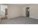 Spacious bedroom featuring neutral walls and plush carpeting for a cozy, inviting atmosphere at 11300 N Casa Dega Dr # 1044, Surprise, AZ 85388