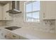 Modern kitchen with stainless steel appliances and backsplash at 11300 N Casa Dega Dr # 1044, Surprise, AZ 85388
