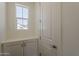 Mud room featuring a window and cabinets at 11300 N Casa Dega Dr # 1044, Surprise, AZ 85388