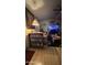 Inviting living room featuring comfortable seating and a large entertainment center at 11596 W Sierra Dawn Blvd # 64, Surprise, AZ 85374