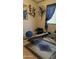 This fitness room includes workout machine and leaf wall decor at 11596 W Sierra Dawn Blvd # 64, Surprise, AZ 85374