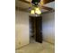 A bedroom featuring neutral walls, carpet, and an open closet at 12639 N 113Th Dr, Youngtown, AZ 85363