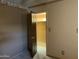 A bedroom featuring neutral walls, carpet, and an open closet at 12639 N 113Th Dr, Youngtown, AZ 85363