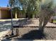 Charming front yard featuring desert landscaping and a well-maintained exterior of this lovely home at 12639 N 113Th Dr, Youngtown, AZ 85363