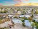 Wide aerial perspective of homes in a quiet neighborhood at sunset at 1317 E Verlea Dr, Tempe, AZ 85282