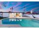 Backyard pool featuring a patio, and house with modern, sleek design at 1317 E Verlea Dr, Tempe, AZ 85282