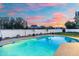 Backyard pool featuring a bright blue sky, patio and a white perimeter fence at 1317 E Verlea Dr, Tempe, AZ 85282