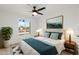 Bright bedroom showcasing a window view, neutral walls, and a comfortable bed with coordinated decor at 1317 E Verlea Dr, Tempe, AZ 85282