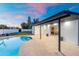 Outdoor pool and patio view featuring a covered patio, recessed lighting, and sliding glass doors at 1317 E Verlea Dr, Tempe, AZ 85282