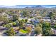 An aerial view showcasing lush, tree-lined streets, swimming pools, and well-maintained homes at 14821 N Hana Maui Dr, Phoenix, AZ 85022