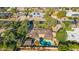 Aerial view showcasing the house, its in-ground pool, and lush landscaping within a well-established neighborhood setting at 14821 N Hana Maui Dr, Phoenix, AZ 85022