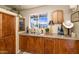 Charming bar area featuring wood cabinetry and countertops, providing a perfect blend of functionality and style at 14821 N Hana Maui Dr, Phoenix, AZ 85022
