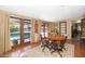 Inviting dining area featuring direct patio access to the pool, enhancing indoor-outdoor living and dining at 14821 N Hana Maui Dr, Phoenix, AZ 85022