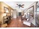 Open concept living room featuring Saltillo tile, classic decor, and ample natural light at 14821 N Hana Maui Dr, Phoenix, AZ 85022