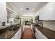 Modern kitchen with sleek cabinets, stainless steel appliances, and an open layout at 1513 W Mitchell Dr, Phoenix, AZ 85015