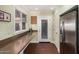 Functional kitchen with long countertops, a stainless steel fridge, and plenty of storage at 1513 W Mitchell Dr, Phoenix, AZ 85015