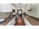 Well-equipped kitchen with modern appliances, ample counter space, and a seamless design at 1513 W Mitchell Dr, Phoenix, AZ 85015